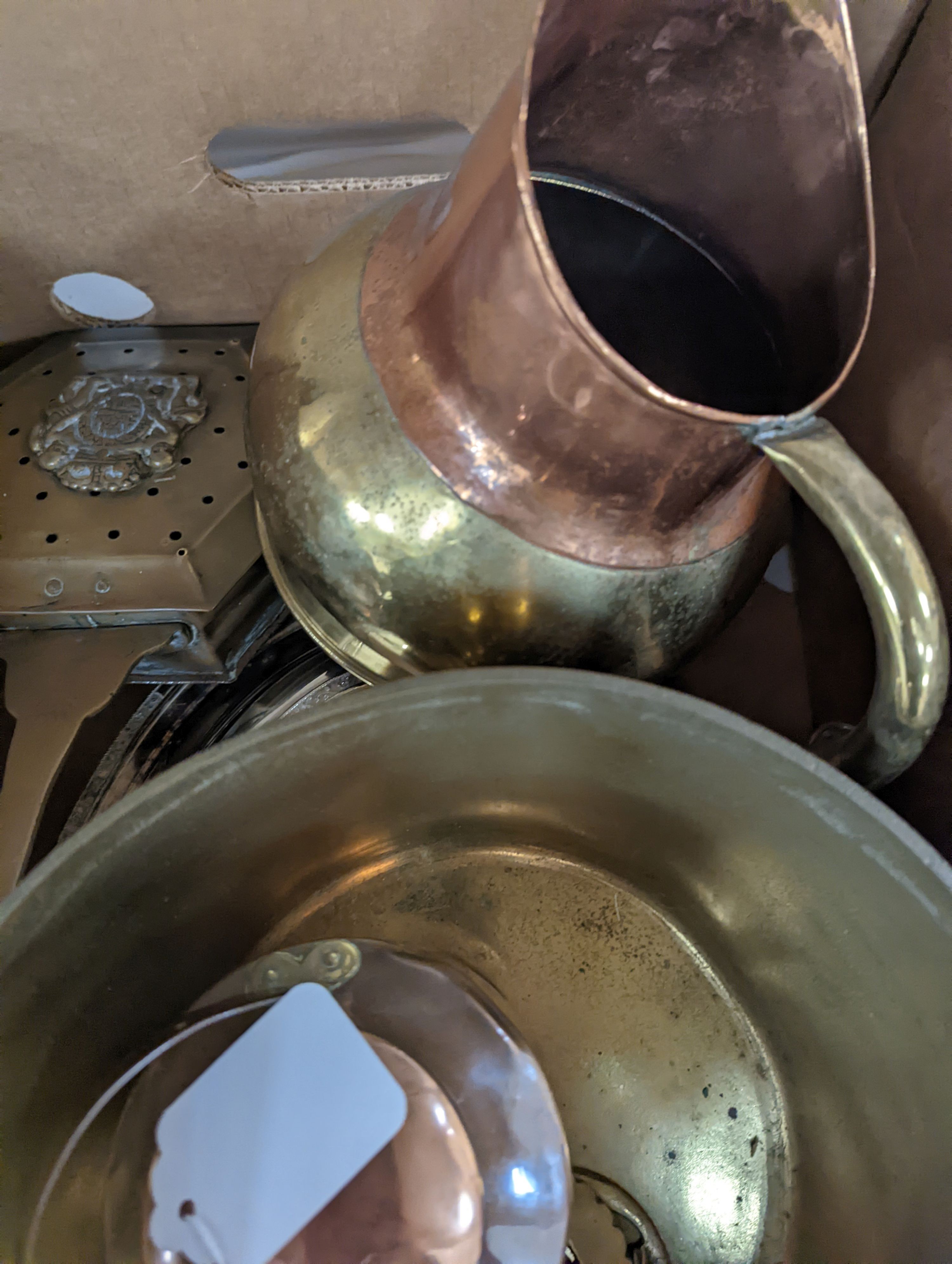 A quantity of copper and brass wares